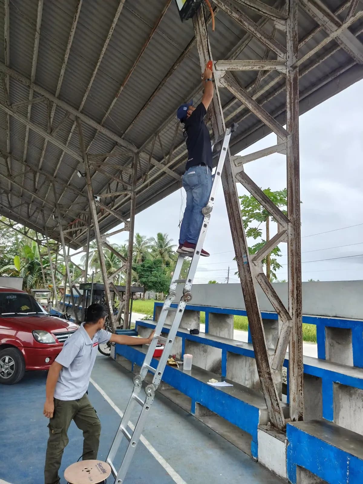 Powerbyte technicians on a job, mid-installation.